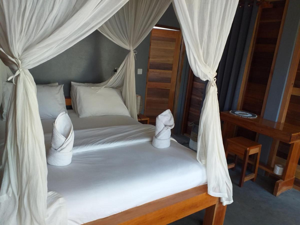 The Geckos Homestay Келимуту Стая снимка