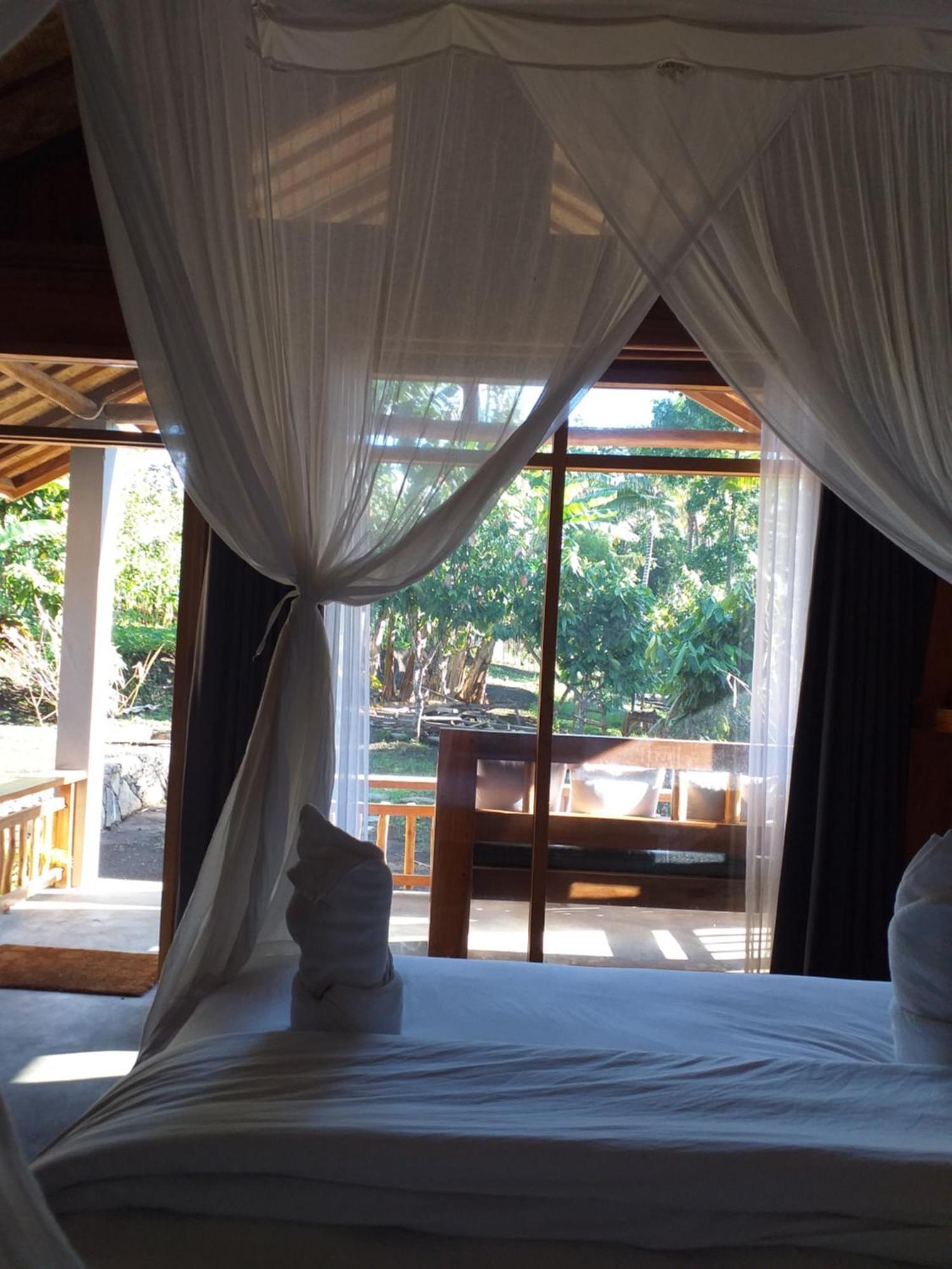 The Geckos Homestay Келимуту Стая снимка
